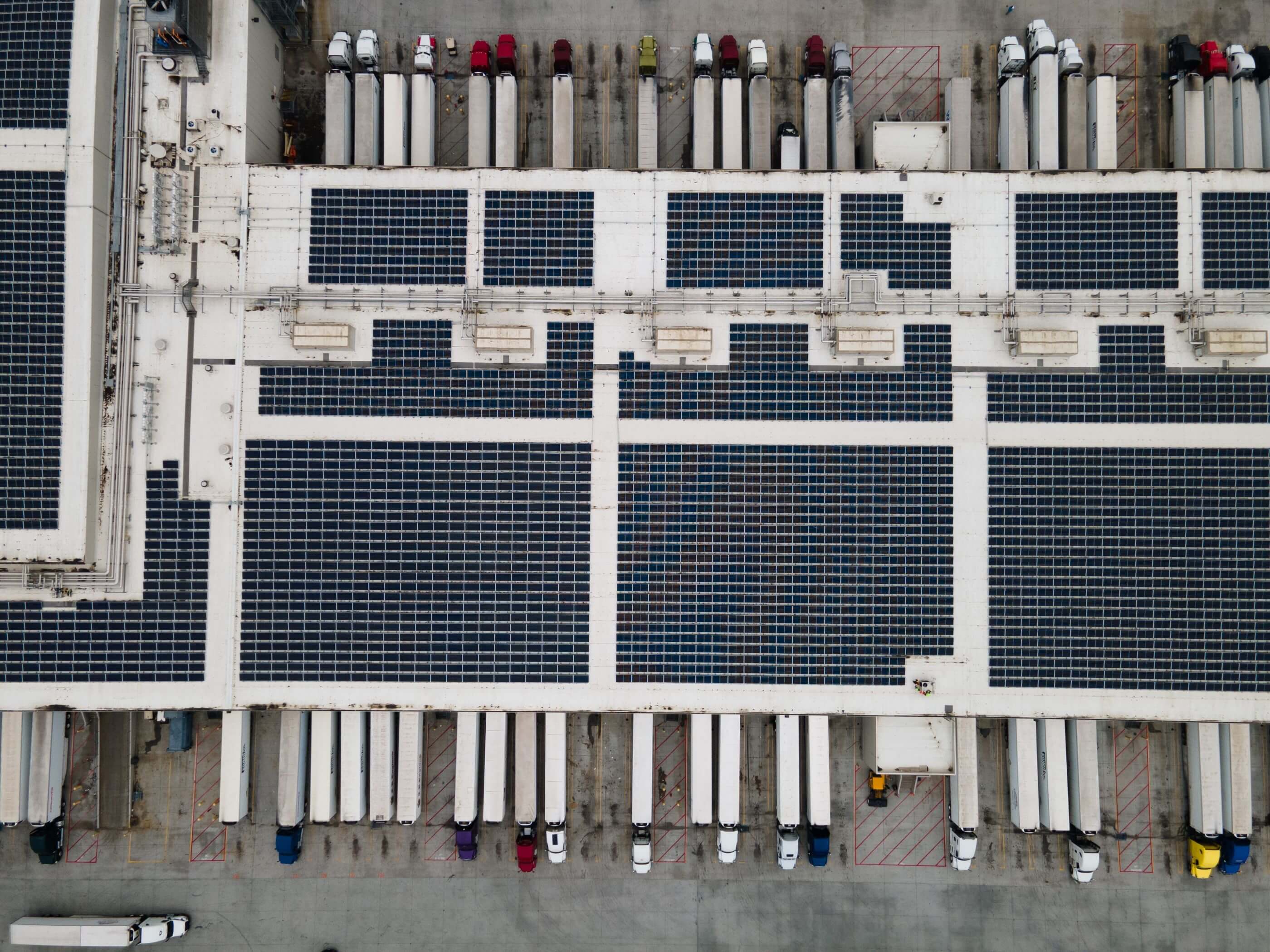 Exterior drone shot of Lineage Colton Agua Mansa cold storage warehouse in Colorado with solar array.