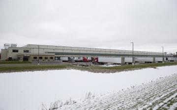 Exterior photo of Lineage's Stevens Point facility with snowy field in the foreground