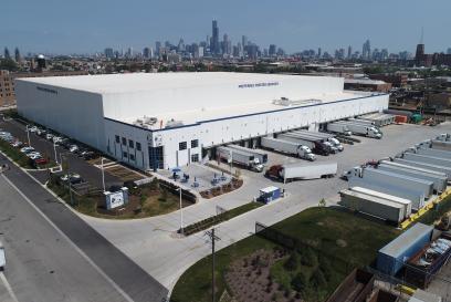 cold storage warehouse aerial photo with chicago skyline in the background
